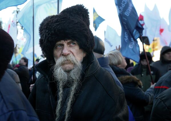 Участник акции против земельной реформы у здания администрации президента Украины в Киеве