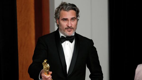 Актер Хоакин Феникс на церемонии вручения премии Оскар