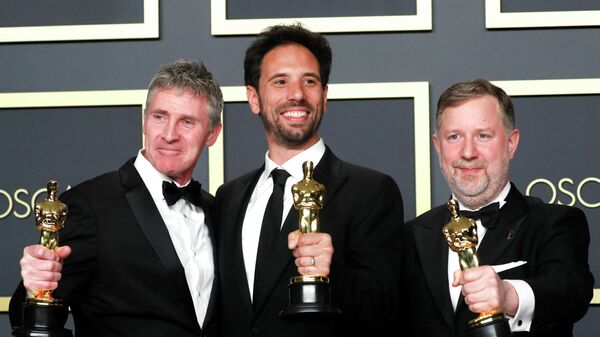 Гийом Рошерон, Грег Батлер и Доминик Туохи на церемонии вручения премии Оскар