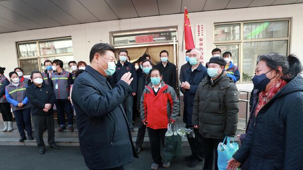 Председатель КНР Си Цзиньпин во время встречи с жителями общины Аньхуа в Пекине. 10 февраля 2020