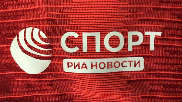Логотип Спорт РИА Новости на форме пляжного футбольного клуба Спартак