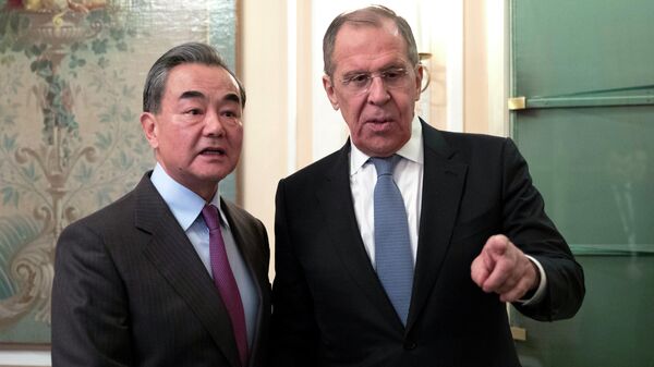 Министр иностранных дел России Сергей Лавров и министр иностранных дел Китая Ван И