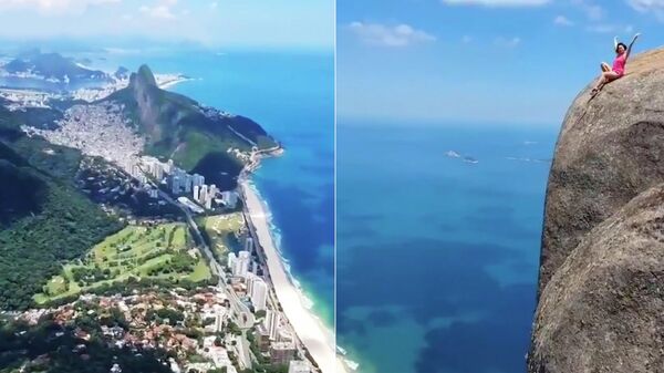 Кадры видео туристки, позирующей на скале Педра-да-Гавеа в Рио-де-Жанейро