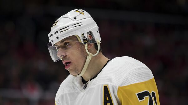 WASHINGTON, DC - FEBRUARY 02: Evgeni Malkin #71 of the Pittsburgh Penguins looks on during the second period of the game against the Washington Capitals at Capital One Arena on February 2, 2020 in Washington, DC.   Scott Taetsch/Getty Images/AFP