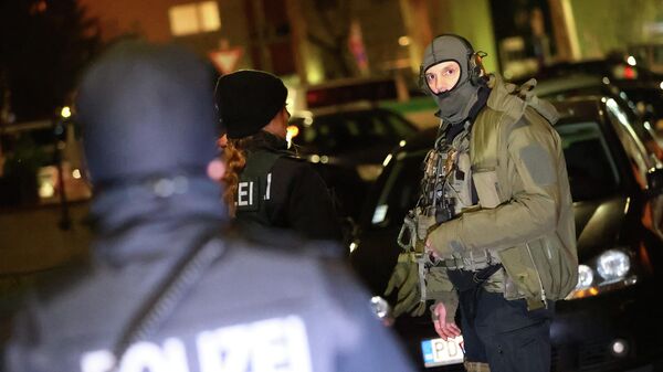 Полиция на месте стрельбы в Ханау под Франкфуртом, Германия. 20 февраля 2020