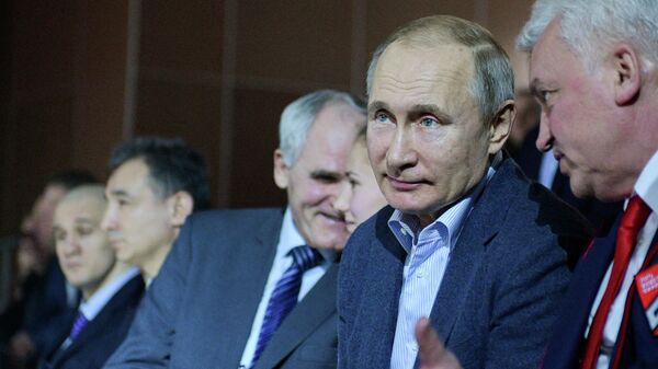 Президент РФ Владимир Путин во время посещения первого чемпионата Лиги боевого самбо, который проходит на олимпийской арене Ледовый куб в Сочи