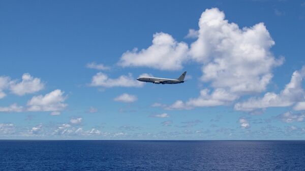 Американский самолет-разведчик P-8A Poseidon в районе острова Гуам в Тихом океане