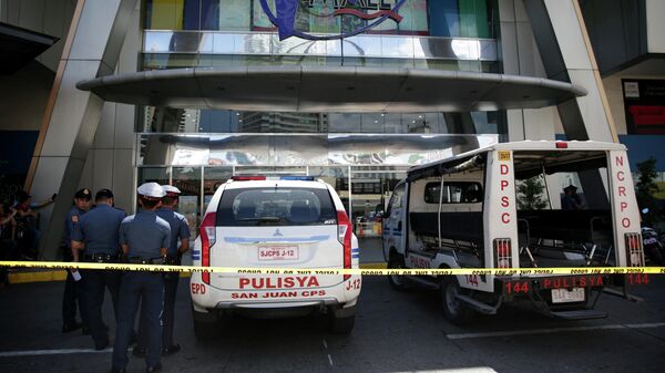Полиция на месте захвата заложников в торговом центре Вирра на Филиппинах