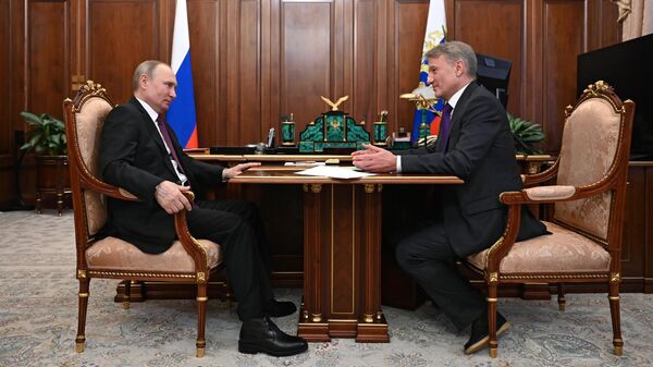  Владимир Путин и президент, председатель правления Сбербанка РФ Герман Греф во время встречи