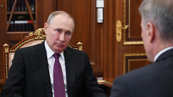 Владимир Путин и президент, председатель правления Сбербанка РФ Герман Греф во время встречи