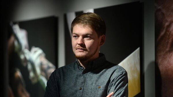Фотокорреспондент Алексей Филиппов, занявший первое место в номинации Спорт с серией фотографий На кончиках пальцев