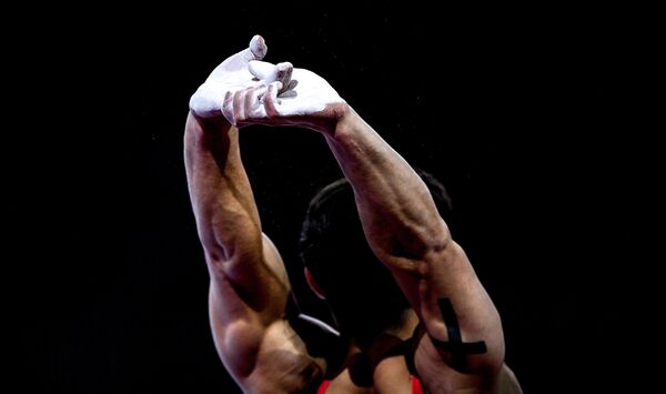 Артур Далалоян (Россия) в финале вольных упражнений среди мужчин на чемпионате мира по спортивной гимнастике в Штутгарте