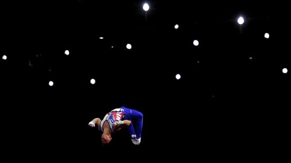 Артур Далалоян (Россия) в командном многоборье среди мужчин на чемпионате мира по спортивной гимнастике в Штутгарте