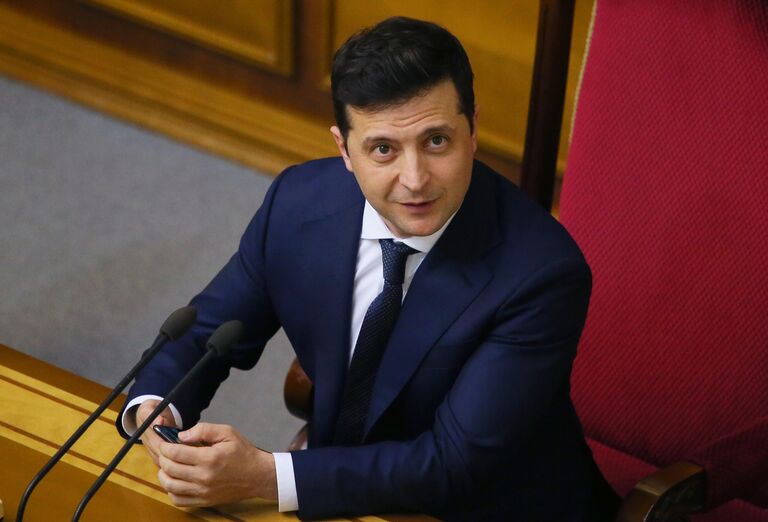 Президент Украины Владимир Зеленский на внеочередном заседании Верховной рады Украины в Киеве. Президент Украины Владимир Зеленский на внеочередном заседании Верховной рады Украины в Киеве.