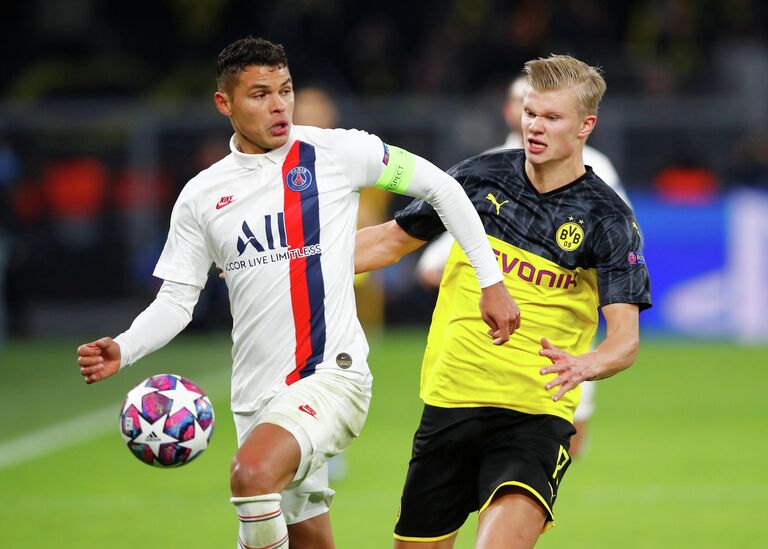 Игрок ПСЖ Тиаго Силва (слева) и футболист Боруссии Эрлинг Холанд 