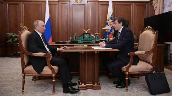 Президент РФ Владимир Путин и министр просвещения Сергей Кравцов во время встречи