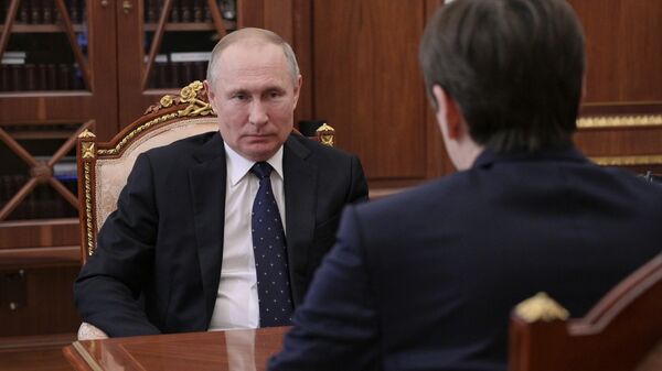 Президент РФ Владимир Путин во время встречи с министром просвещения Сергеем Кравцовым