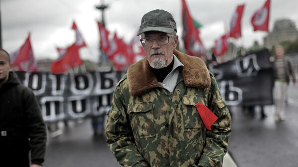 Писатель Эдуард Лимонов во время проведения марша протеста Антикапитализм-2012 в Москве