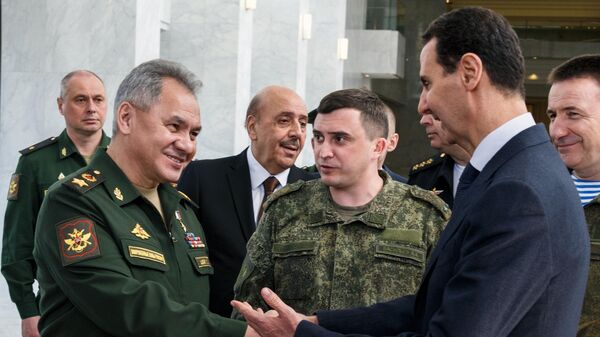 Министр обороны РФ генерал армии Сергей Шойгу и президент Сирийской Арабской Республики Башар Асад во время встречи в Дамаске