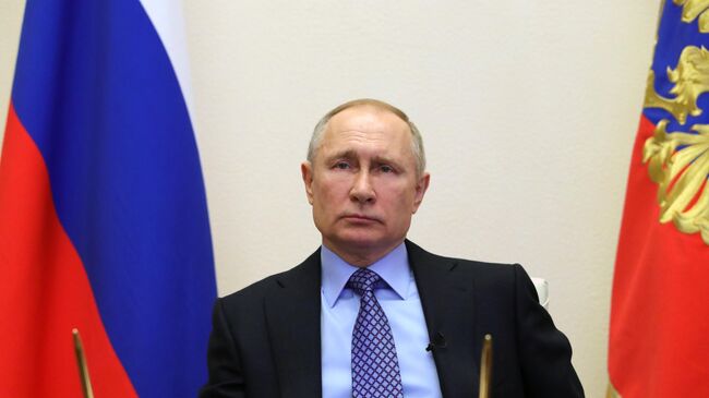 Президент РФ Владимир Путин во время обращения к гражданам РФ
