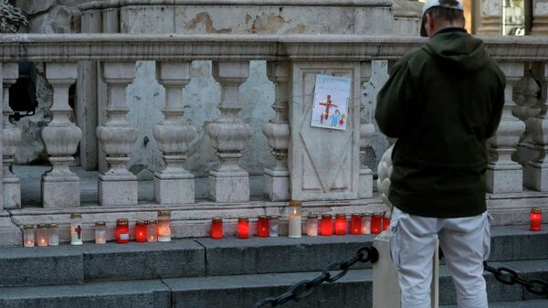 Свечи в память о тех, кто пострадал от коронавируса в Вене, Австрия