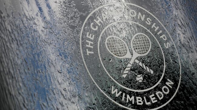 FILE PHOTO: All England Lawn Tennis and Croquet Club, London, Britain - June 30, 2019  General view of the Wimbledon logo   REUTERS/Hannah McKay/File Photo