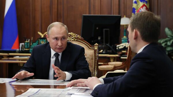 Владимир Путин во время встречи с Юрием Трутневым и Александром Козловым