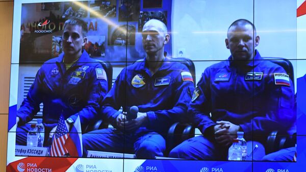 Онлайн-конференция экипажа МКС-63 в Международном мультимедийном пресс-центре МИА Россия сегодня в Москве