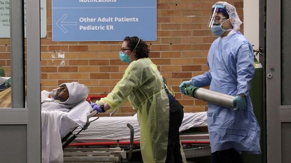 Медицинский персонал во время эпидемии коронавируса в медицинском центре в Бруклине, Нью-Йорка