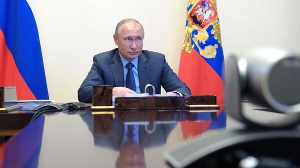 Президент РФ Владимир Путин во время встречи в режиме видеоконференции с губернатором Приморского края Олегом Кожемяко