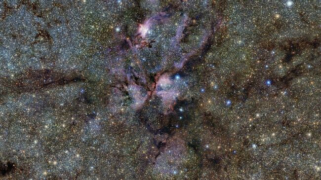 Область звездообразования в туманности NGC 6357 созвездия Скорпиона, где звездные системы обмениваются астероидами, как наша Солнечная система 4,5 миллиарда лет назад