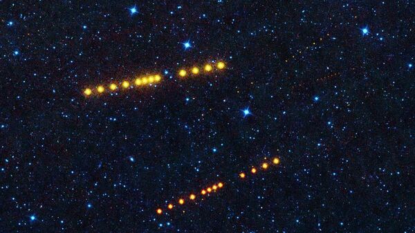 Серия фотографий астероидов Клото и Лина, снятые телескопом NEOWISE