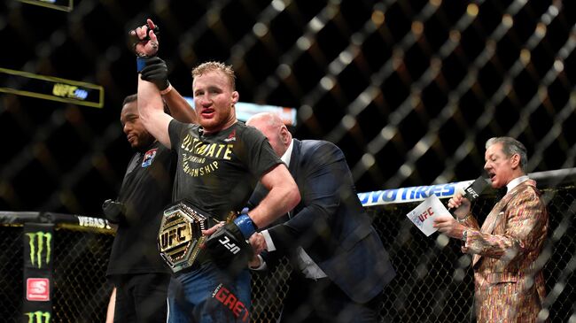 JACKSONVILLE, FLORIDA - MAY 09: Justin Gaethje of the United States celebrates after defeating Tony Ferguson of the United States in their Interim lightweight title fight during UFC 249 at VyStar Veterans Memorial Arena on May 09, 2020 in Jacksonville, Florida.   Douglas P. DeFelice/Getty Images/AFP