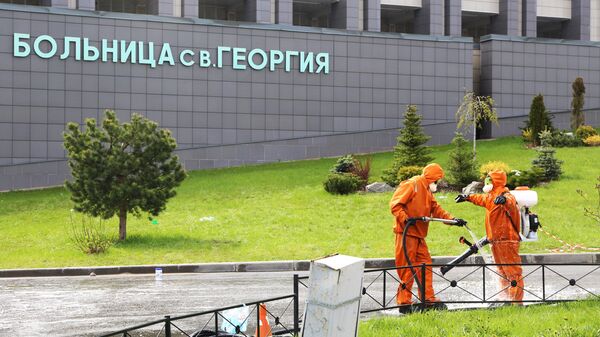 Дезинфекция территории больницы Святого Георгия в Санкт-Петербурге после тушения пожара