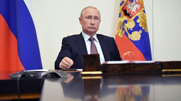 Президент РФ Владимир Путин проводит в режиме видеоконференции совещание по открытию в субъектах РФ медицинских центров, построенных силами министерства обороны РФ