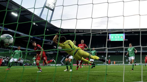 Leverkusen's German midfielder Kai Havertz (2nd L) scores the 1-2 goal during the German first division Bundesliga football match Werder Bremen v Bayer 04 Leverkusen on May 18, 2020 in Bremen, northern Germany as the season resumed following a two-month absence due to the novel coronavirus COVID-19 pandemic. (Photo by Stuart FRANKLIN / POOL / AFP) / DFL REGULATIONS PROHIBIT ANY USE OF PHOTOGRAPHS AS IMAGE SEQUENCES AND/OR QUASI-VIDEO