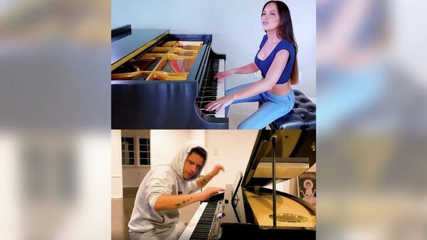 Стоп-кадр видео музыкального дуэта американской пианистки Лолы Астановой и бразильско-итальянско-американского музыканта Руди Манкузо