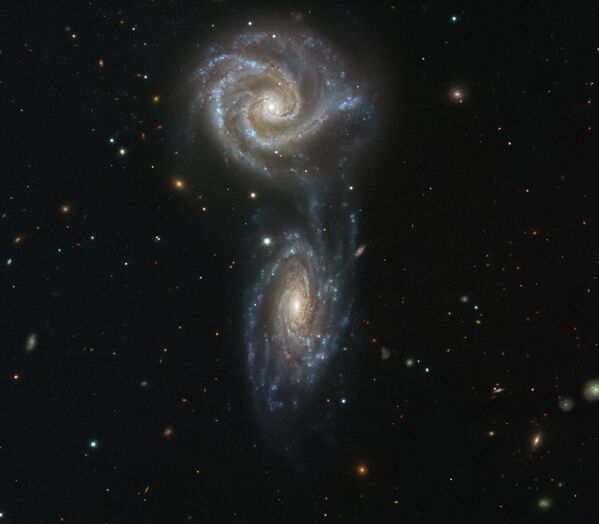Спиральные взаимодействующие галактики NGC 5426 и NGC 5427