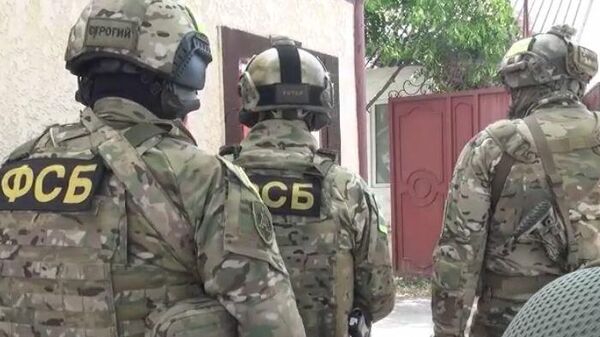 Сотрудники ФСБ во время операции в ингушском городе Сунже по ликвидации двух бандитов, готовивших теракты на территории республики