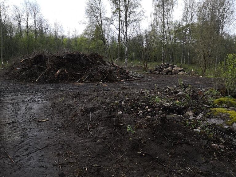 Повреждение в деревне Ольховка Приозерского района Ленинградской области в ходе производства земляных работ объектов археологического наследия