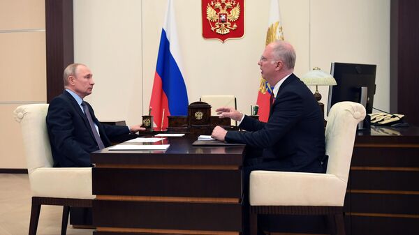 Президент РФ Владимир Путин и генеральный директор РФПИ Кирилл Дмитриев во время встречи