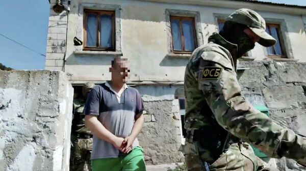 Кадр видео спецоперации по задержанию подозреваемых в подготовке теракта в Симферополе