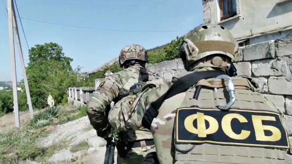 Кадр видео спецоперации по задержанию подозреваемых в подготовке теракта в Симферополе