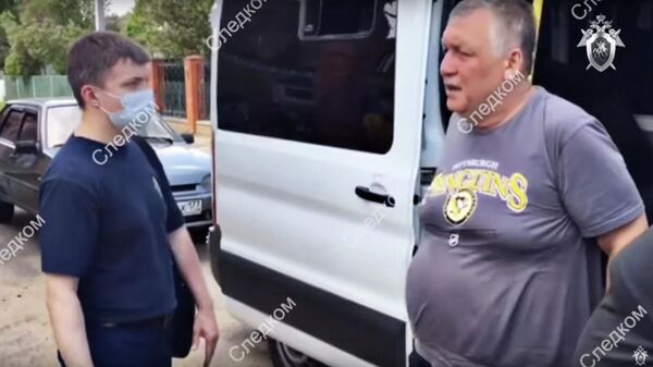 Кадр видео задержания подозреваемого в занятии высшего положения в преступной иерархии в Московской области