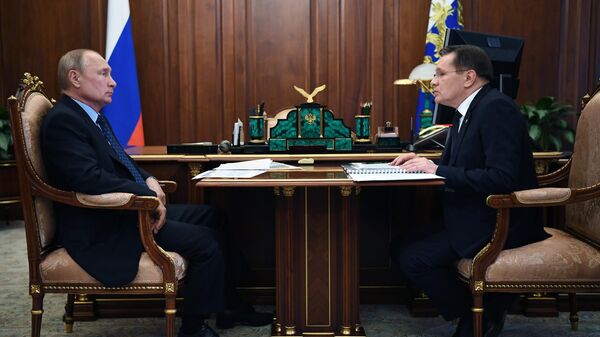  Президент РФ Владимир Путин и генеральный директор государственной корпорации по атомной энергии Росатом Алексей Лихачев во время встречи