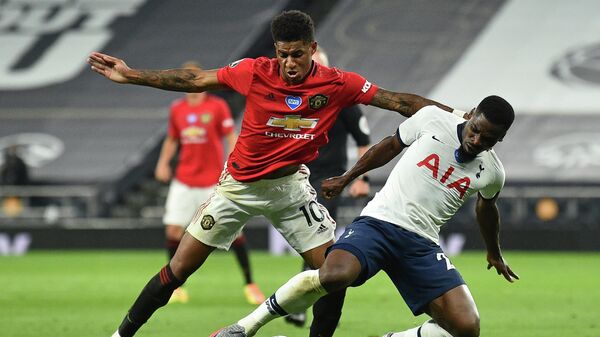 Manchester United's English striker Marcus Rashford (L) vies with Tottenham Hotspur's Ivorian defender Serge Aurier (R) during the English Premier League football match between Tottenham Hotspur and Manchester United at Tottenham Hotspur Stadium in London, on June 19, 2020. - The match ended 1-1. (Photo by Glyn KIRK / POOL / AFP) / RESTRICTED TO EDITORIAL USE. No use with unauthorized audio, video, data, fixture lists, club/league logos or 'live' services. Online in-match use limited to 120 images. An additional 40 images may be used in extra time. No video emulation. Social media in-match use limited to 120 images. An additional 40 images may be used in extra time. No use in betting publications, games or single club/league/player publications. / 