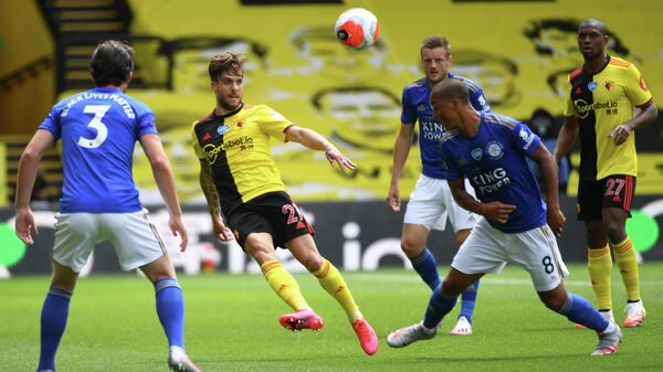 Watford's Spanish defender Kiko Femenia (2L) clears the ball during the English Premier League football match between Watford and Leicester City at Vicarage Road Stadium in Watford, north of London on June 20, 2020. (Photo by ANDY RAIN / POOL / AFP) / RESTRICTED TO EDITORIAL USE. No use with unauthorized audio, video, data, fixture lists, club/league logos or 'live' services. Online in-match use limited to 120 images. An additional 40 images may be used in extra time. No video emulation. Social media in-match use limited to 120 images. An additional 40 images may be used in extra time. No use in betting publications, games or single club/league/player publications. / 