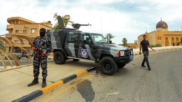 Сотрудники сил безопасности в Триполи, Ливия