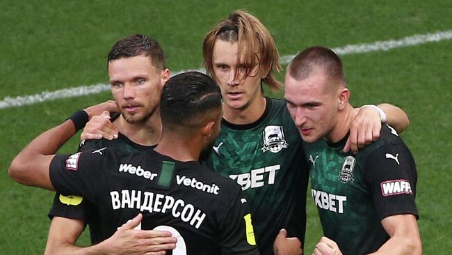 Krasnodar's Marcus Berg celebrates with his team mates after scoring a goal during the Russian Premier-League soccer match between Krasnodar and Akhmat Grozny, in Krasnodar, Russia.