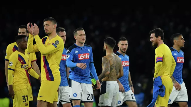 Barcelona's players and Napoli's players react after a draw in the UEFA Champions League round of 16 first-leg football match between SSC Napoli and FC Barcelona at the San Paolo Stadium in Naples on February 25, 2020. (Photo by Filippo MONTEFORTE / AFP) Barcelona's players and Napoli's players react after a draw in the UEFA Champions League round of 16 first-leg football match between SSC Napoli and FC Barcelona at the San Paolo Stadium in Naples on February 25, 2020. (Photo by Filippo MONTEFORTE / AFP)